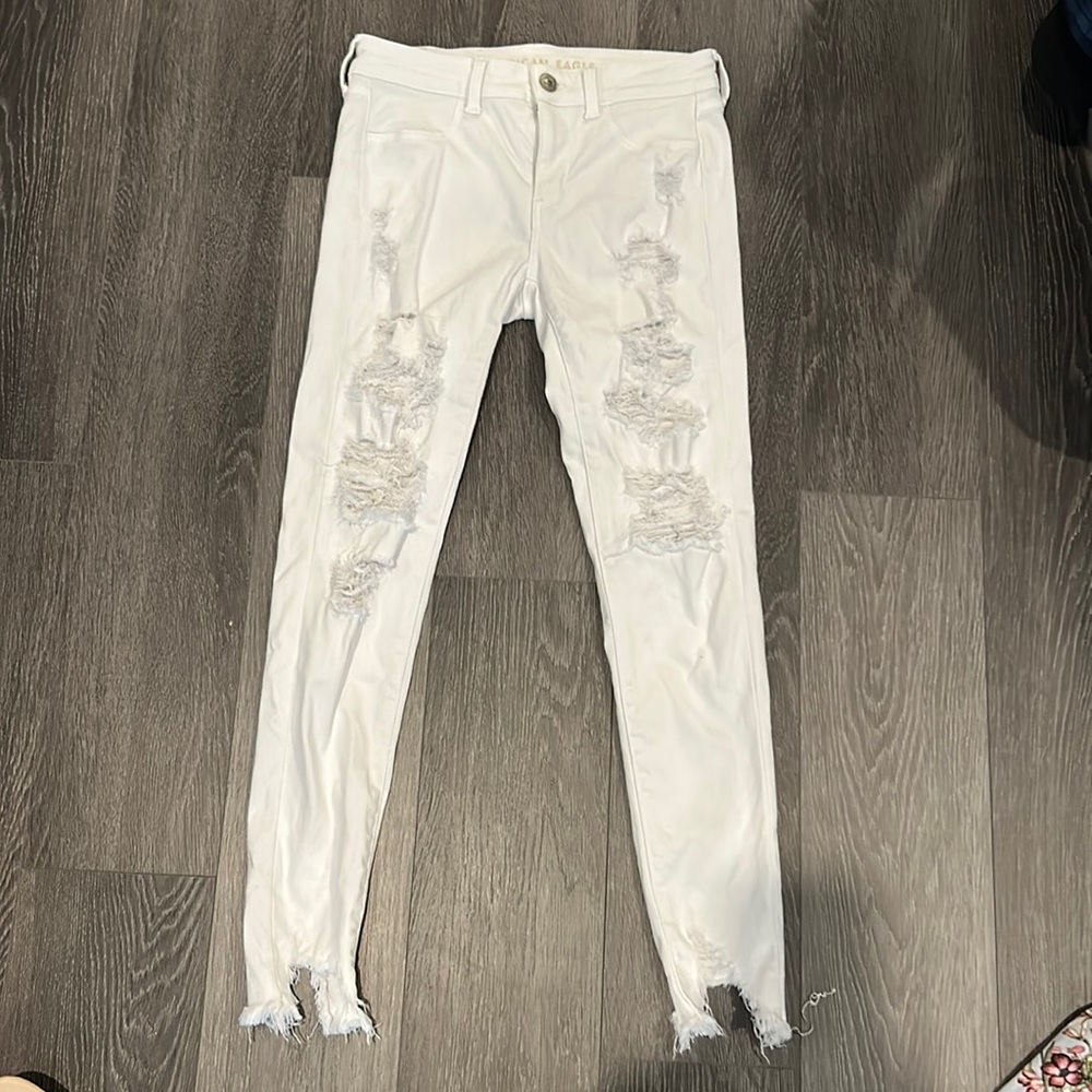 White ripped American eagle jeans
